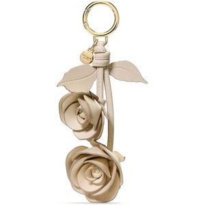 image:imagekate spade new york Charmed Smooth Leather On A Roll Taxi Leather Bag CharmCashew Milk Stacked Rose